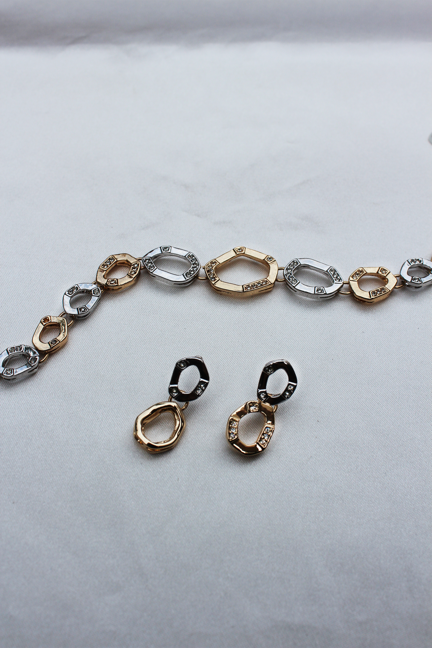 Set arete y brazalete bicolor