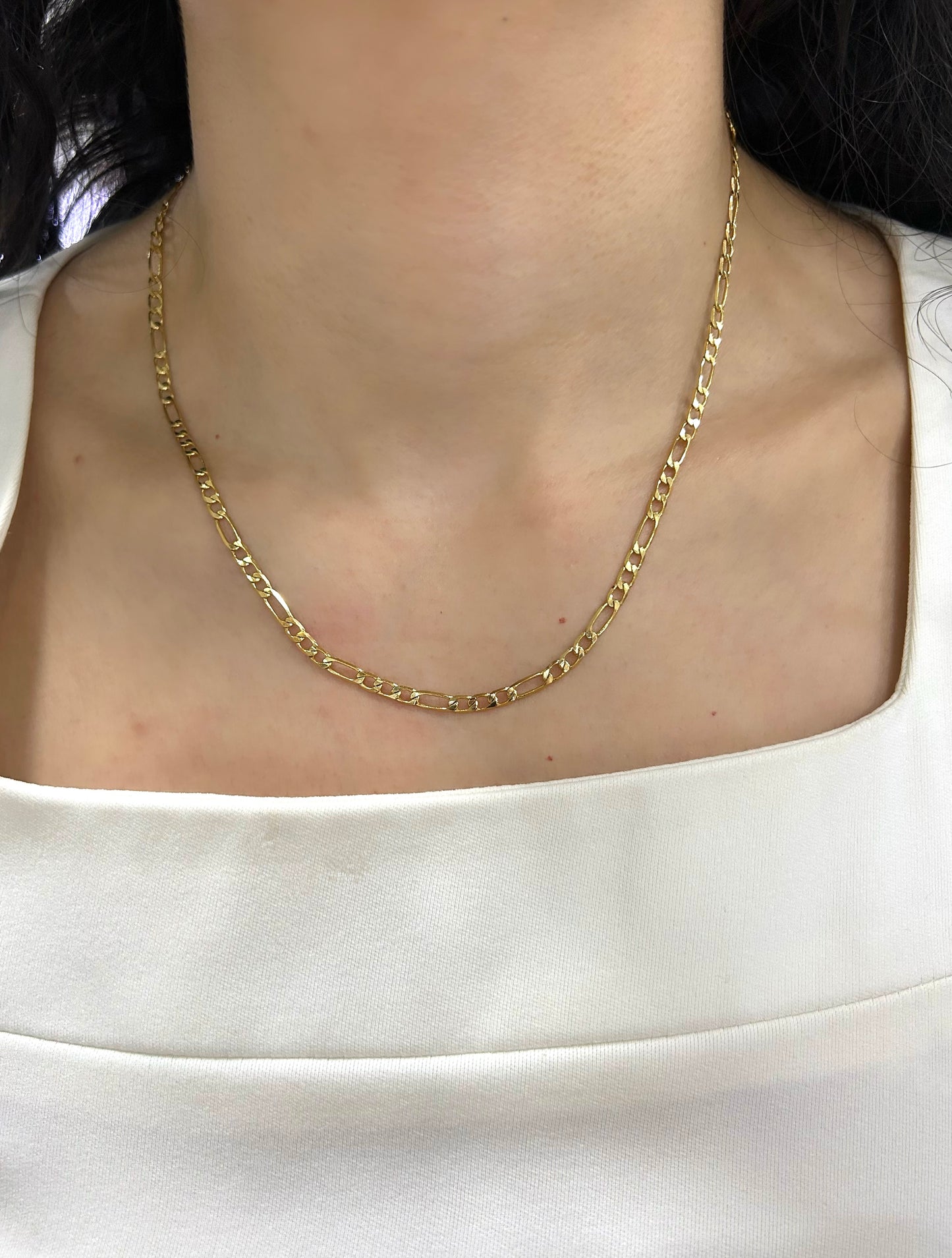 Cadena cartier dorada
